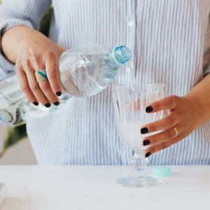 Pouring a glass of water